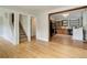 Hardwood floors complement this space, leading to both the kitchen and staircase at 1324 Virginia St, Idaho Springs, CO 80452