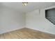 Living room with wood floors and neutral paint at 1324 Virginia St, Idaho Springs, CO 80452