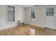 Living room with a window and door, plus hardwood floors at 1324 Virginia St, Idaho Springs, CO 80452