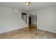 Living room featuring a hardwood floor and bright, neutral paint at 1324 Virginia St, Idaho Springs, CO 80452