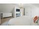 This is a bedroom featuring white walls, carpet, and white bedding at 6830 Lamar St, Arvada, CO 80003