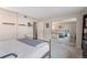This bedroom features a mirrored sliding door closet and neutral paint at 7755 E Quincy Ave # 207A3, Denver, CO 80237