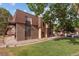The exterior features a well-manicured lawn and brick accents at 7755 E Quincy Ave # 207A3, Denver, CO 80237