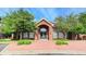 Beautiful brick building exterior with manicured landscaping and inviting entrance at 1651 W Canal Cir # 613, Littleton, CO 80120