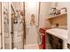 Functional laundry space with washer, dryer, and water heater for household convenience at 1651 W Canal Cir # 613, Littleton, CO 80120
