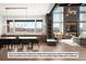 Open concept dining room with modern light fixture and mountain views at 5191 Lions Paw St, Castle Rock, CO 80104