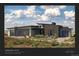Modern home exterior with three-car garage and landscaping at 5191 Lions Paw St, Castle Rock, CO 80104