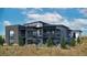 Contemporary home with a spiral staircase and expansive views at 5191 Lions Paw St, Castle Rock, CO 80104