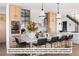 Modern kitchen with white countertops and black barstools at 5191 Lions Paw St, Castle Rock, CO 80104