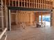 Under construction living room with framing and future windows at 5191 Lions Paw St, Castle Rock, CO 80104