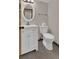A half bathroom featuring a white vanity at 8871 E Amherst Dr # B, Denver, CO 80231