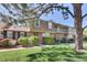 Beautiful brick townhomes with well-kept lawns, showcasing a lovely residential community at 8871 E Amherst Dr # B, Denver, CO 80231