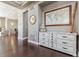 Bright entryway with hardwood floors and decorative console table at 7144 Galaxy Ct, Castle Rock, CO 80108