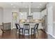 Modern kitchen with a spacious island and stainless steel appliances at 7144 Galaxy Ct, Castle Rock, CO 80108