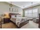 Luxurious main bedroom with plush carpeting and large windows at 7144 Galaxy Ct, Castle Rock, CO 80108