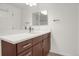 Contemporary bathroom featuring a large mirror, sleek vanity with ample storage, and modern fixtures at 9227 Rolling Way # 201, Parker, CO 80134