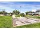 A well-maintained community park featuring a playground and basketball court at 9227 Rolling Way # 201, Parker, CO 80134