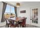 Cozy dining area with natural light, modern light fixture and stylish furniture at 9227 Rolling Way # 201, Parker, CO 80134