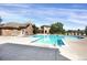 Stunning community pool with pristine water, comfortable lounge chairs, and surrounding landscaping at 9227 Rolling Way # 201, Parker, CO 80134