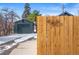 Exterior view showing a new wooden fence with the street number on it at 469 S Perry St, Denver, CO 80219