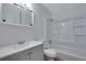 Bathroom featuring a white vanity, bathtub, and toilet at 10390 Tumbleweed Dr # 7, Thornton, CO 80229