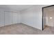 Neutral bedroom features a gray carpet and bright walls at 10390 Tumbleweed Dr # 7, Thornton, CO 80229