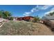 Spacious backyard with a covered patio, lawn and partial fencing at 2533 E 90Th Pl, Thornton, CO 80229