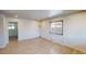 Inviting living room with wood floors, neutral walls and natural light from the window at 2533 E 90Th Pl, Thornton, CO 80229