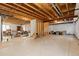 Spacious unfinished basement, offering ample storage space and potential for customization at 2488 Lake Vista Dr, Broomfield, CO 80023