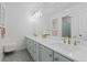 Charming bathroom features double sinks, plenty of counter space, and modern lighting at 2488 Lake Vista Dr, Broomfield, CO 80023