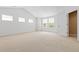 Bright bedroom with lots of natural light and neutral-toned walls and carpet at 2488 Lake Vista Dr, Broomfield, CO 80023