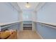 This large walk-in closet has built in shelving at 2488 Lake Vista Dr, Broomfield, CO 80023