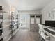 Comfortable home office space with shelving, a window, stylish built-in cabinet and desk at 5342 S Halifax Cir, Centennial, CO 80015
