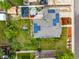 Aerial view of home with solar panels, a large yard, gazebo, and a charming water feature at 10478 Ogden St, Northglenn, CO 80233