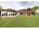 Beautiful backyard showcasing a gazebo, play set, and well-maintained lawn, perfect for entertaining at 10478 Ogden St, Northglenn, CO 80233