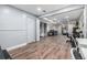 Finished basement with living area, study area, and wood-look flooring at 10478 Ogden St, Northglenn, CO 80233