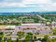 Community view showcasing shopping center and distant skyline with beautiful blue sky at 10478 Ogden St, Northglenn, CO 80233