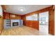 Finished basement with wood paneling and a cozy fireplace at 1935 Nome St, Aurora, CO 80010