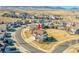Aerial view of the home highlighting its location in a well-planned community with mountain views at 8726 Gardenia Cir, Arvada, CO 80005