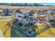 Expansive backyard with a patio, playset, and fenced yard, perfect for outdoor activities and entertaining at 8726 Gardenia Cir, Arvada, CO 80005