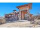 Exterior shot of the community clubhouse featuring an impressive stone facade and a welcoming entrance at 8726 Gardenia Cir, Arvada, CO 80005