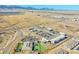 Aerial view of the commercial area showcasing stores, restaurants, and other businesses, offering convenient shopping at 8726 Gardenia Cir, Arvada, CO 80005