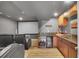 Home theater with seating and a refreshment station, perfect for movie nights at 8726 Gardenia Cir, Arvada, CO 80005
