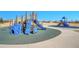 Community playground with slides, climbing structures, and safe, padded ground, ideal for outdoor fun at 8726 Gardenia Cir, Arvada, CO 80005