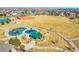 Aerial view of the community playground, perfect for families with children to enjoy outdoor activities and recreation at 8726 Gardenia Cir, Arvada, CO 80005