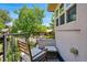 Relaxing balcony with comfortable seating and views of the surrounding neighborhood at 557 S Clarkson St, Denver, CO 80209
