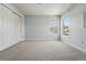 Well lit bedroom with closet and two windows providing lots of light at 557 S Clarkson St, Denver, CO 80209