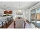 Charming dining room with elegant table set and sliding glass doors to backyard at 557 S Clarkson St, Denver, CO 80209