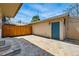 Outdoor patio featuring stone pavers, string lights, and a fenced perimeter for privacy at 557 S Clarkson St, Denver, CO 80209