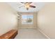Spare bedroom with large window and unique wooden bench at 6772 Tiger Tooth, Littleton, CO 80124